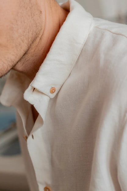 La chemise col boutonné blanche